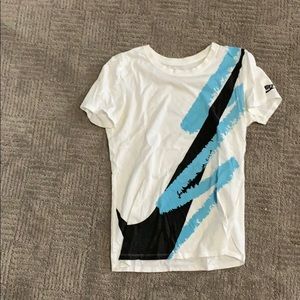White Nike shirt